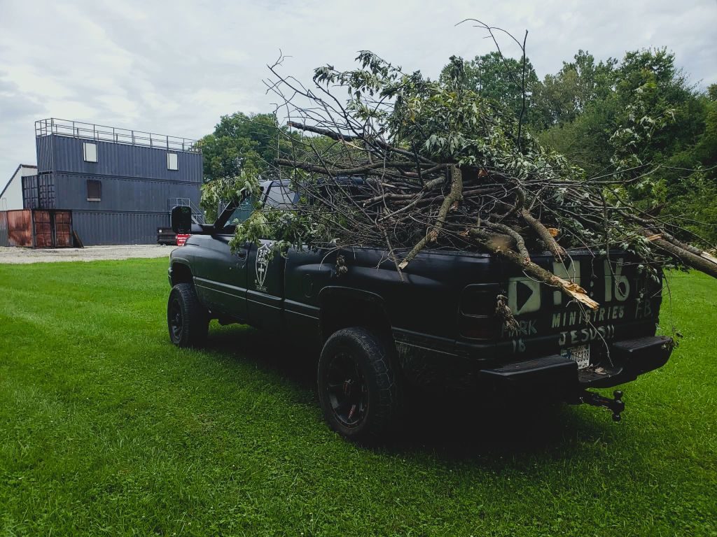 3:16 truck hauling storm branches