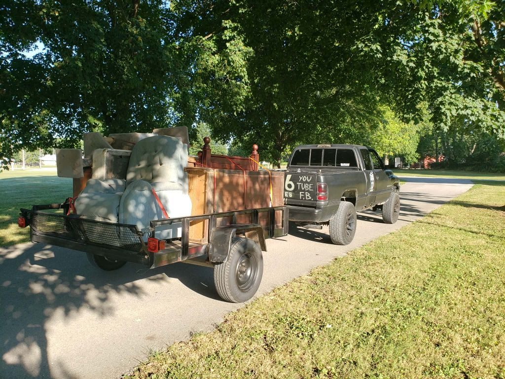 3:16 truck and trailer hauling furniture